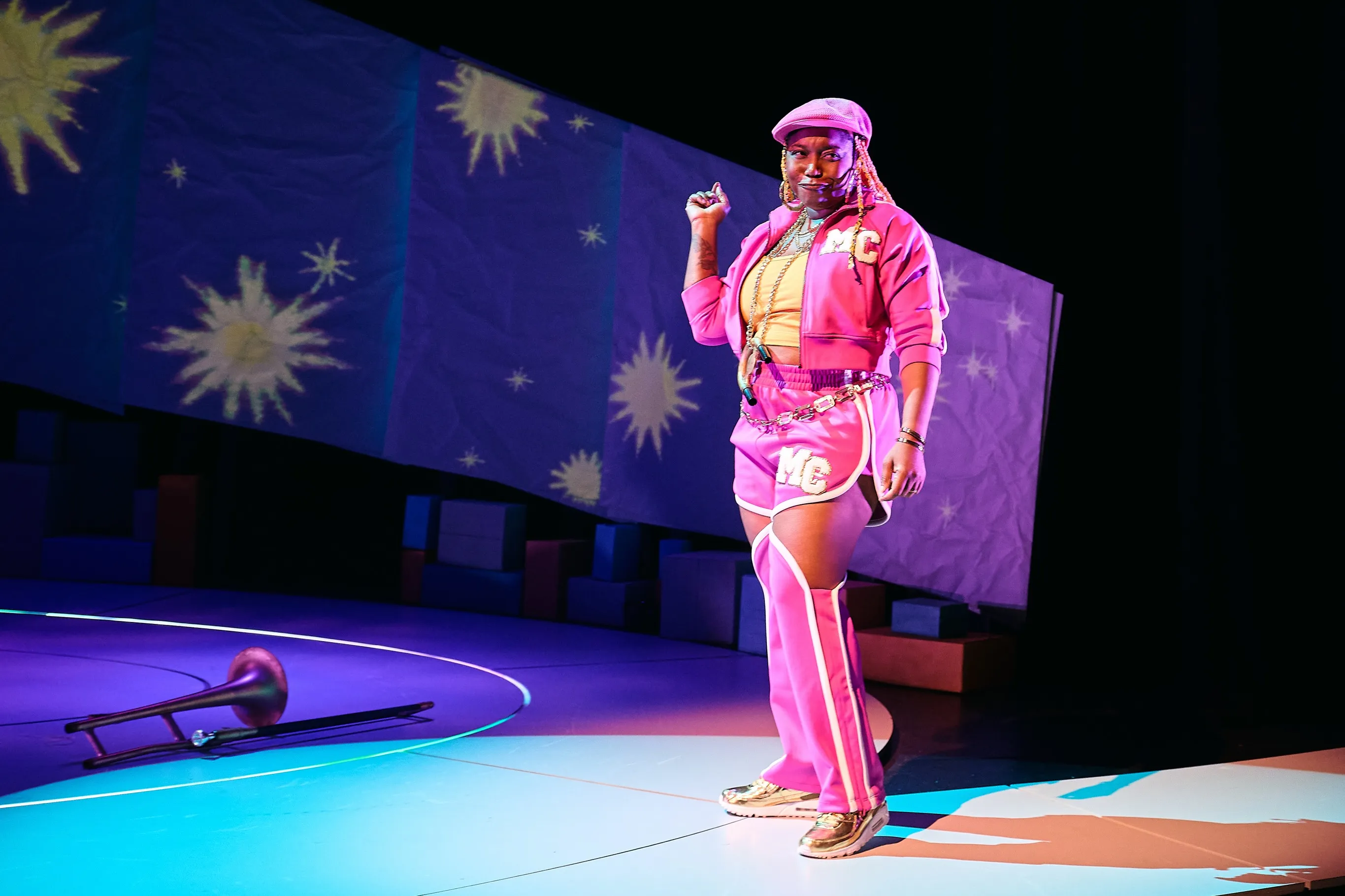 Abigail in the pink-banner scene from Creation Stories