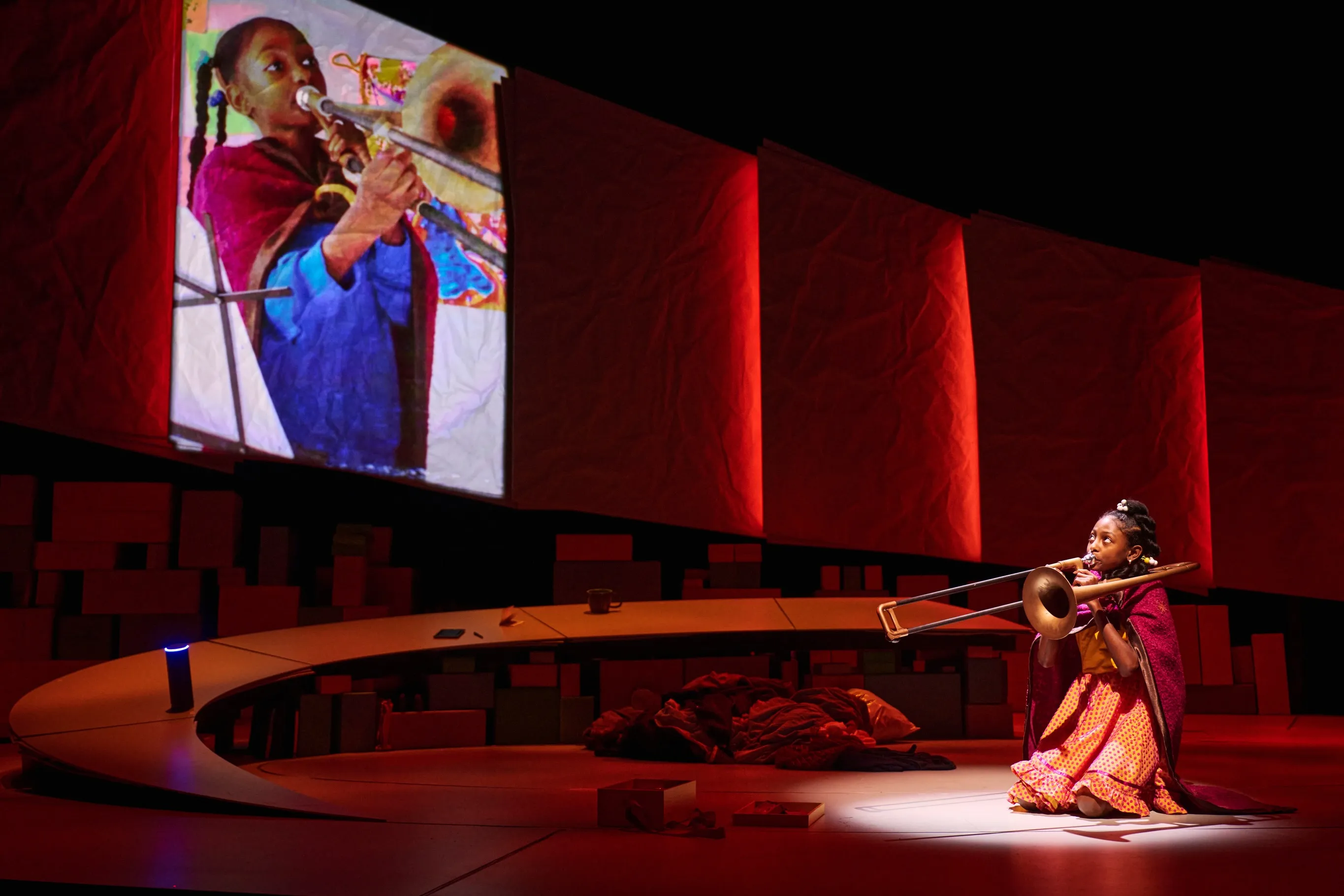 Abigail in the trombone scene from Creation Stories